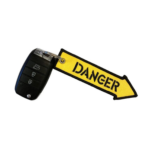 Nyckelband - DANGER - Gul pil - Action King