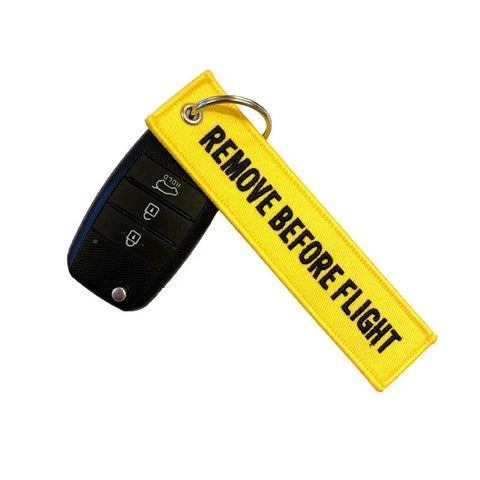 Nyckelband - REMOVE BEFORE FLIGHT / FOLLOW ME - Gul/Svart
