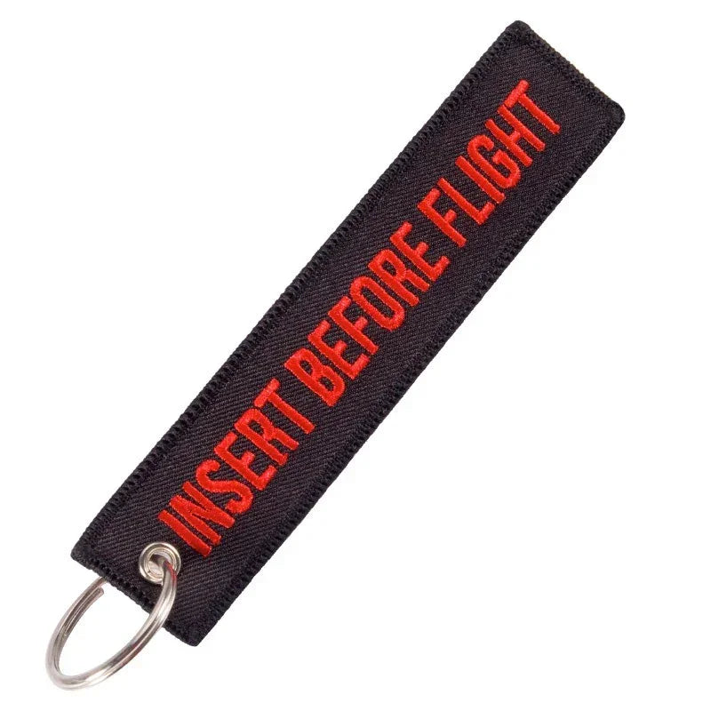 Nyckelband - INSERT BEFORE FLIGHT - Svart/Röd - Action King