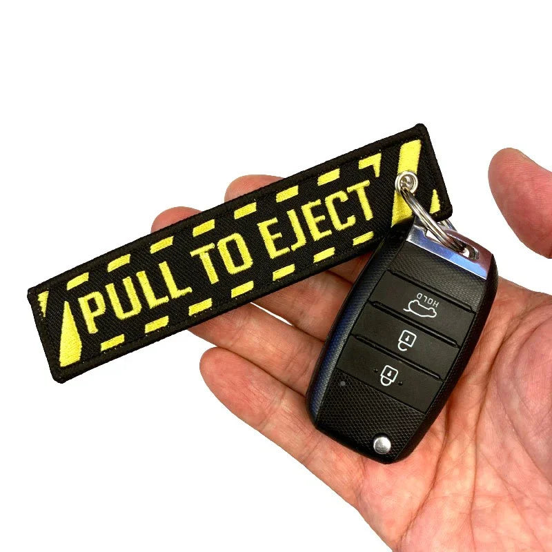 Nyckelband - PULL TO EJECT - Svart/Gul - Action King