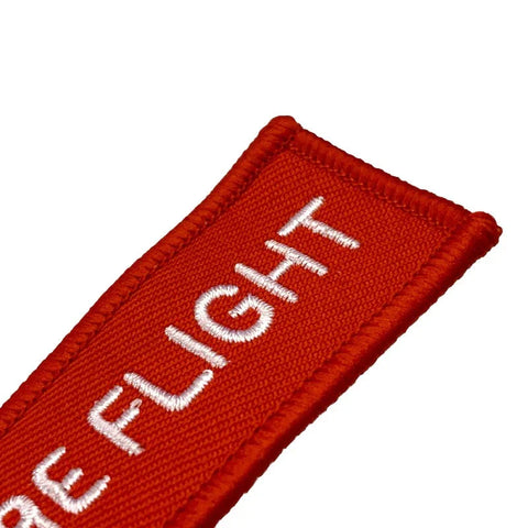 Nyckelband - REMOVE BEFORE FLIGHT - Röd/Vit Pil