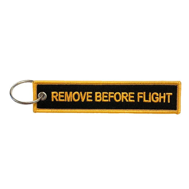 Nyckelband - REMOVE BEFORE FLIGHT - Svart/Orange - Action King